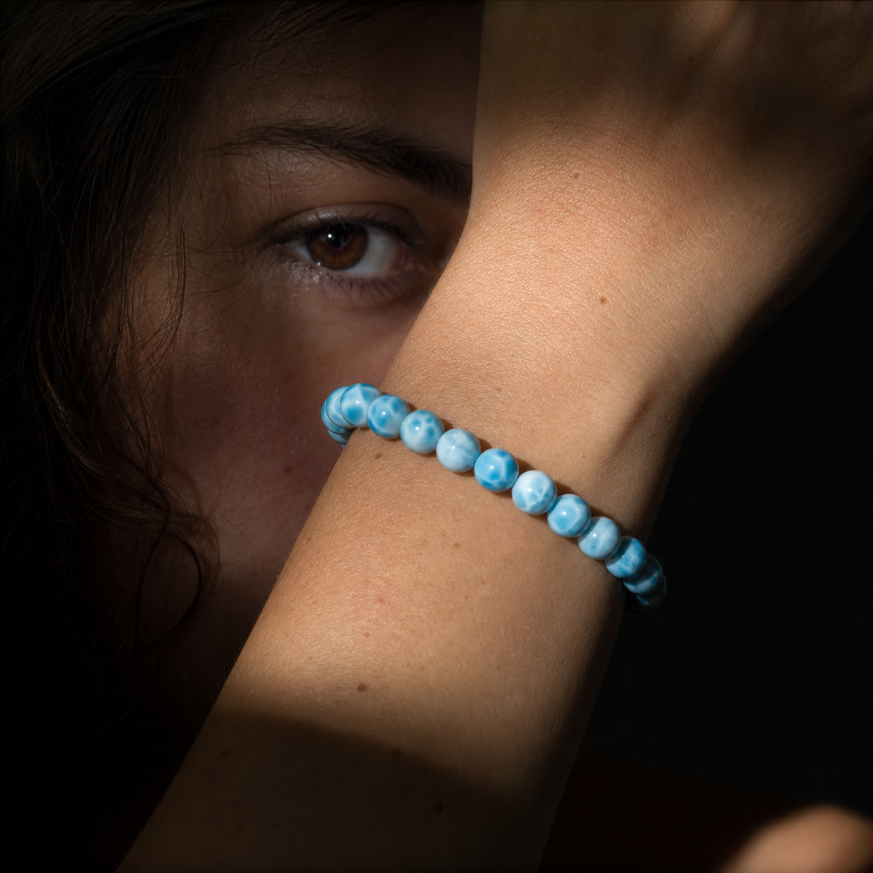 Close wrist detail of Larimar