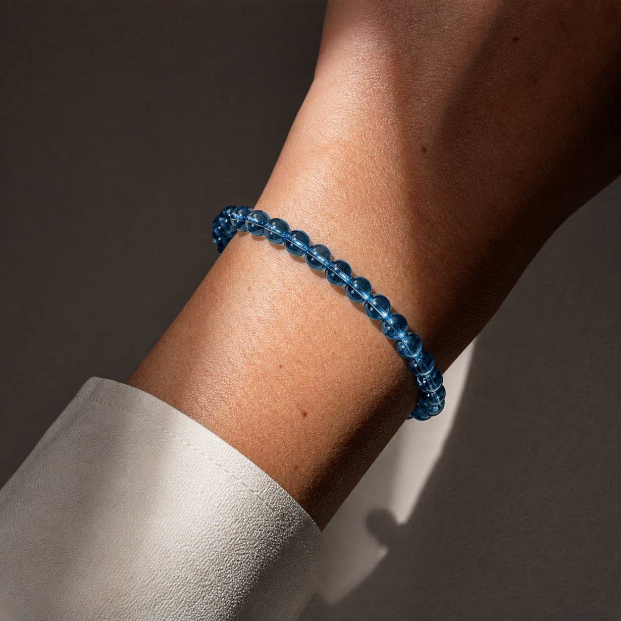 Close wrist detail of Blue Topaz
