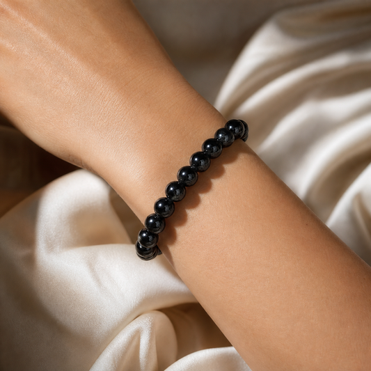 Cropped wrist view of Black Rutilated Quartz