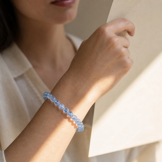 Cropped wrist view of Blue Rutilated Quartz