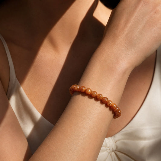Cropped wrist view of Copper Rutilated Quartz