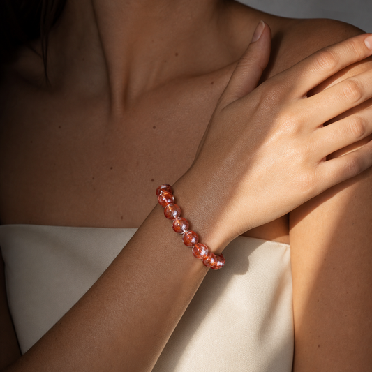 Cropped wrist view of Red Hematoid Quartz
