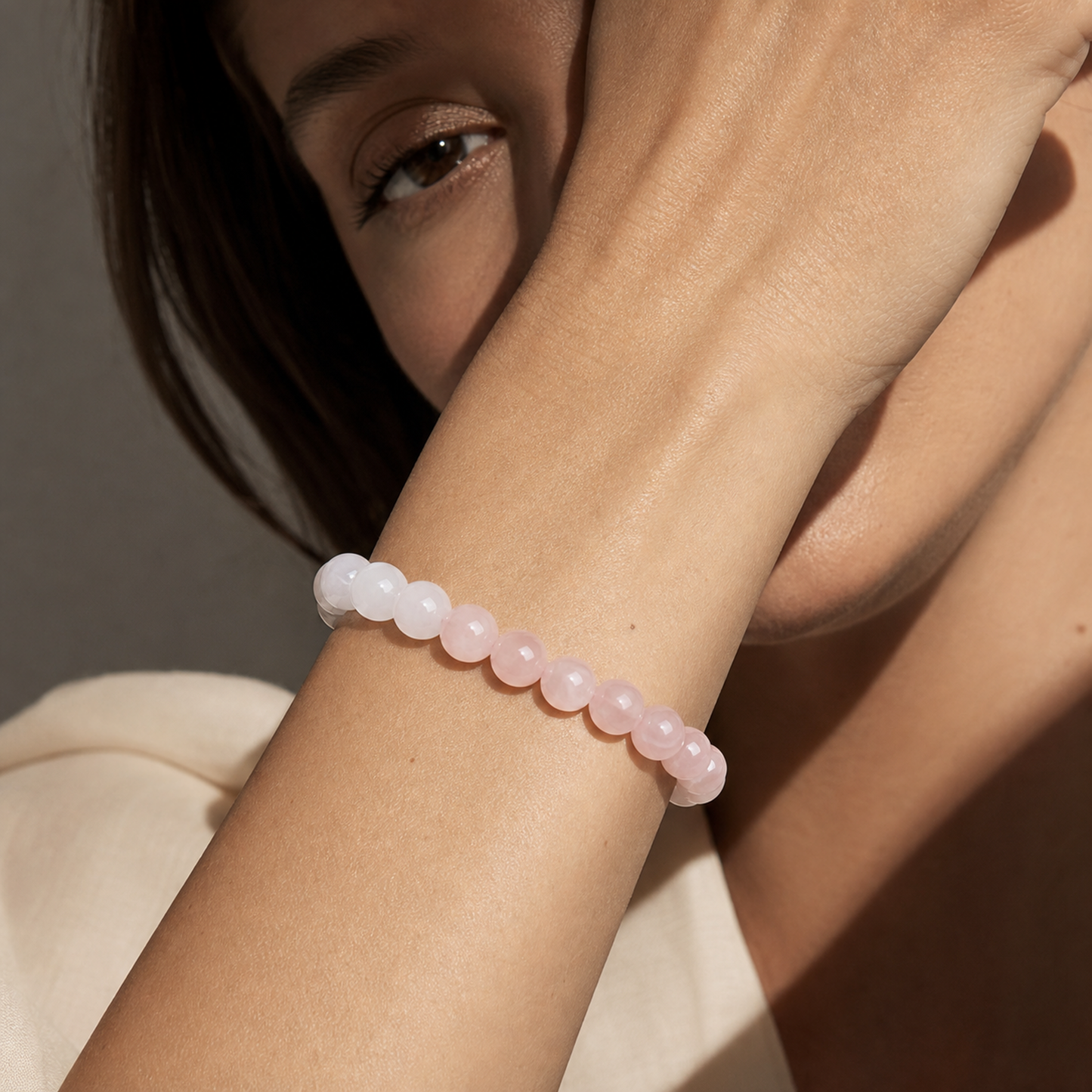 Close wrist detail of Rose Quartz