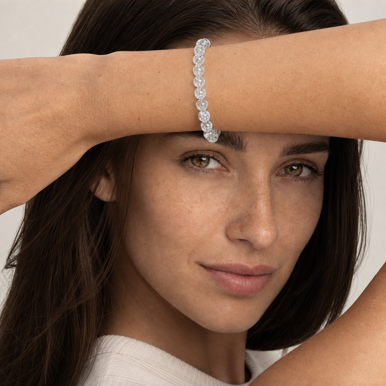 Snow Azeztulite worn by a woman with the bracelet in focus