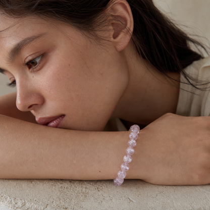 Pink Azeztulite worn by a woman with the bracelet in focus