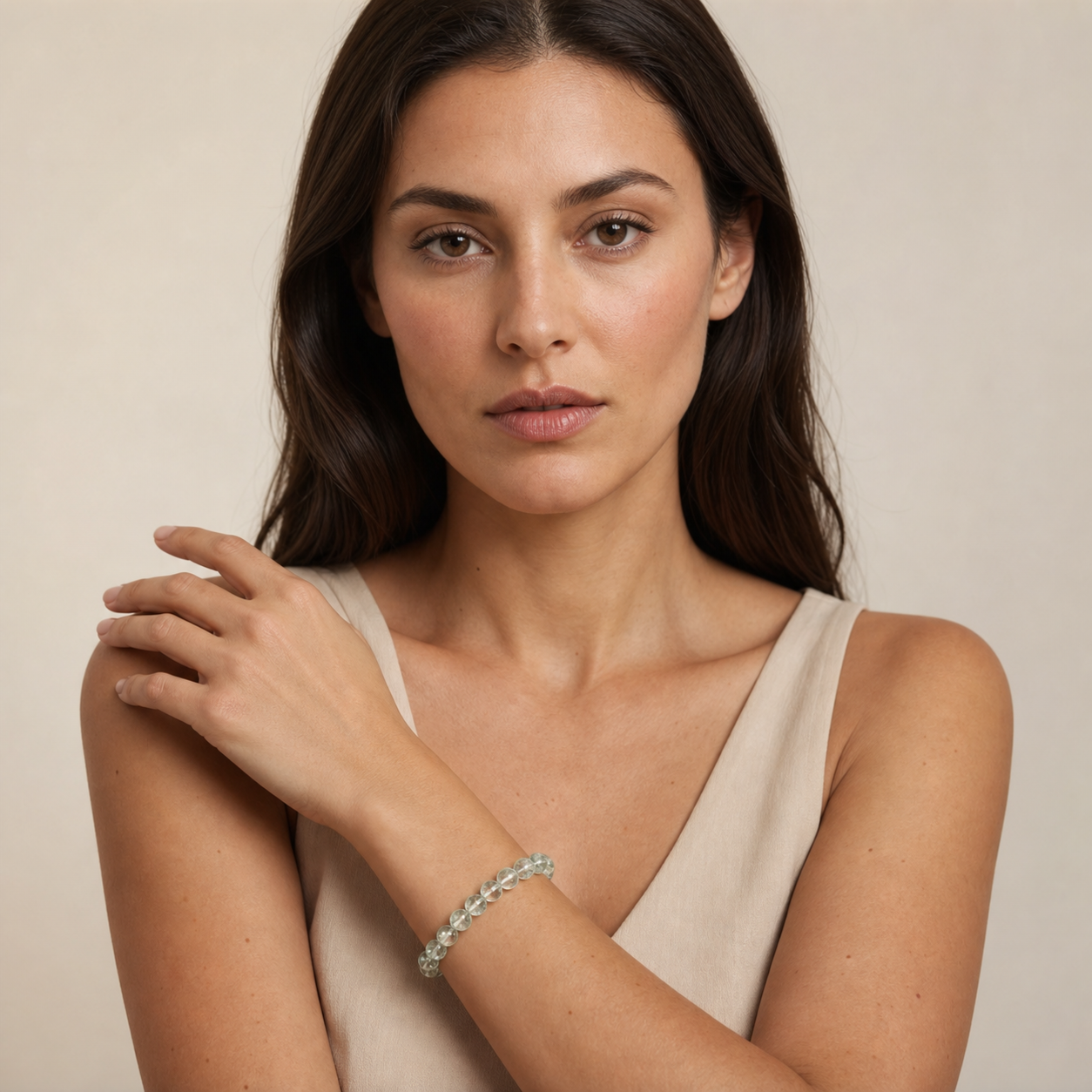 Green Azeztulite worn by a woman with the bracelet in focus