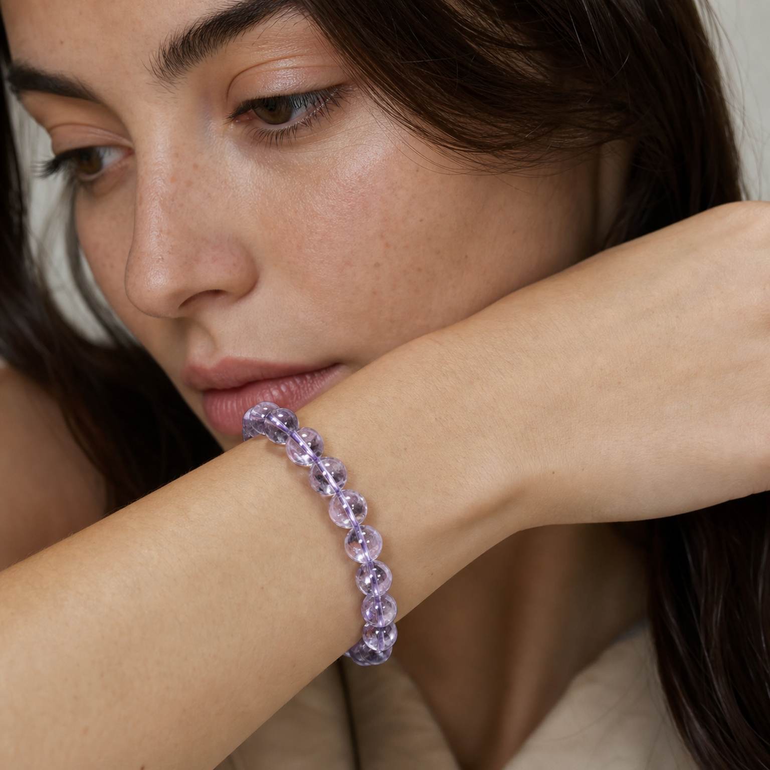 Purple Azeztulite styled on a woman in a close product view