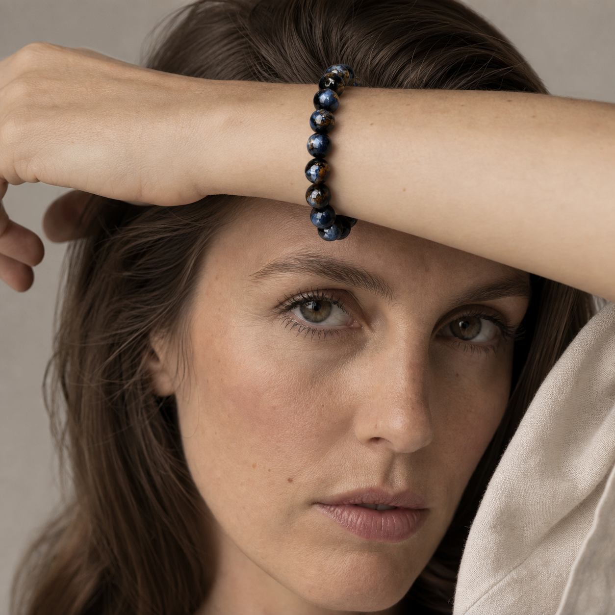 Pietersite styled on a woman in a close product view