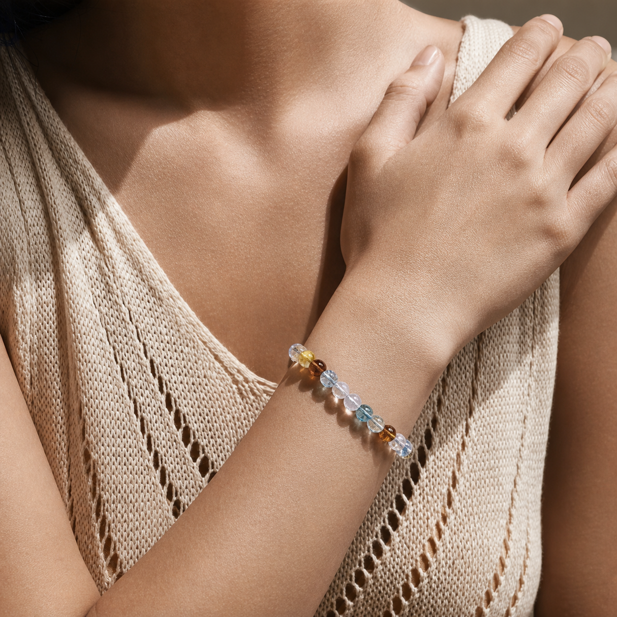 Cropped wrist view of Rainbow Topaz