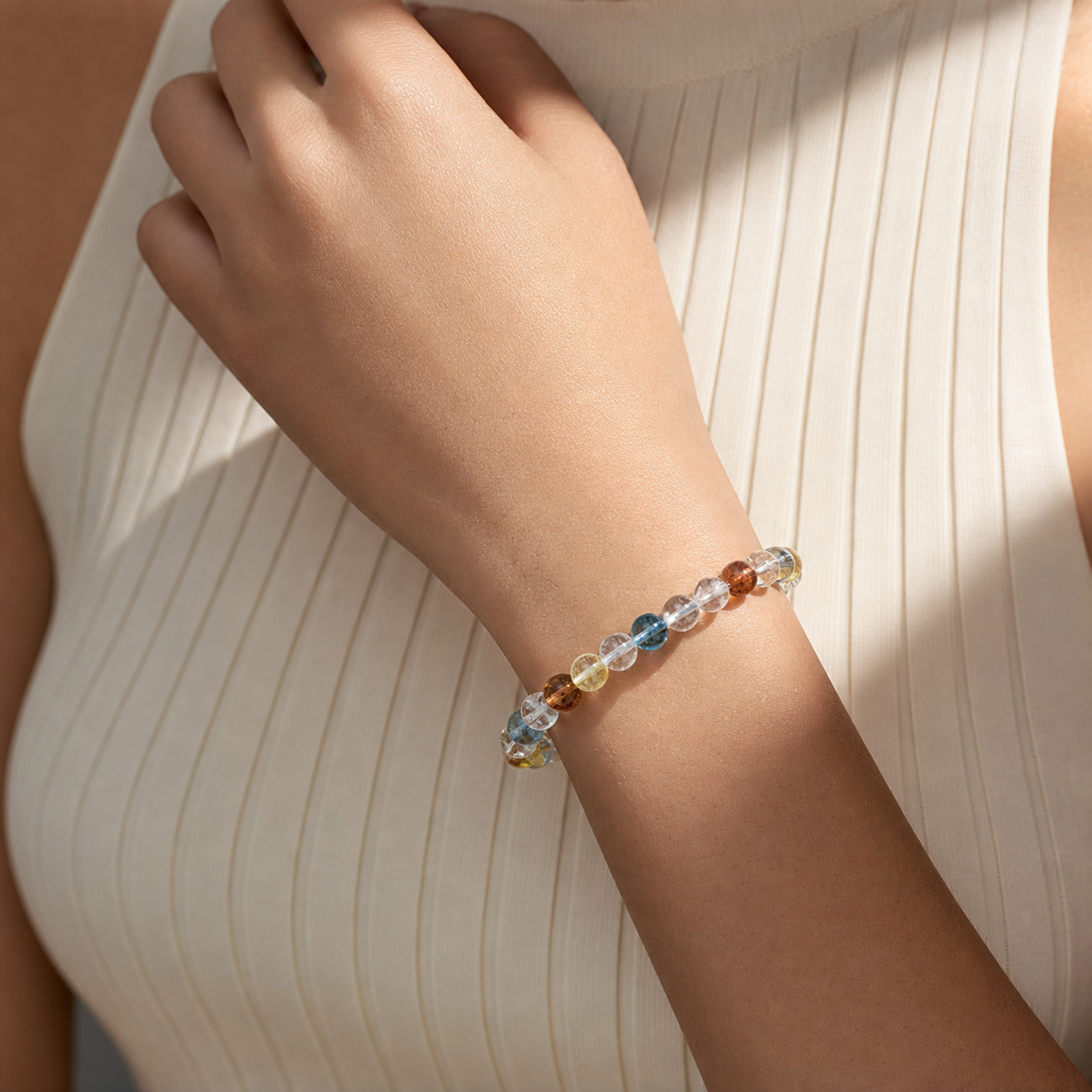 Close wrist detail of Rainbow Topaz