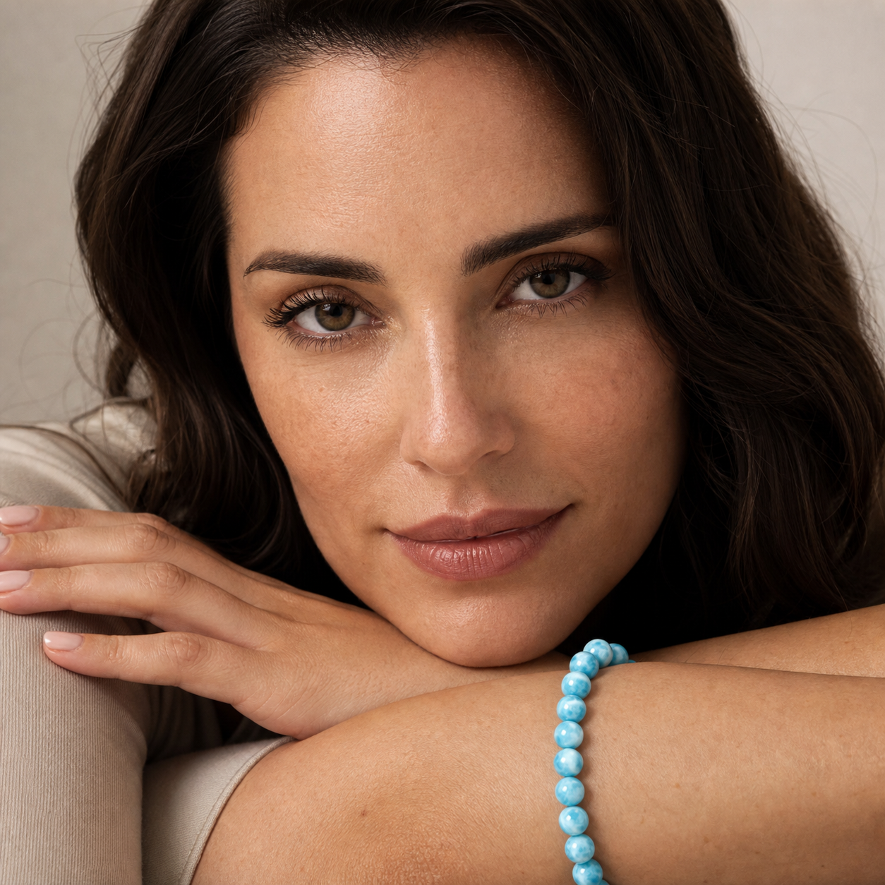 Larimar shown on a woman from a second angle