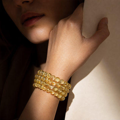 Cropped wrist view of Yellow Topaz