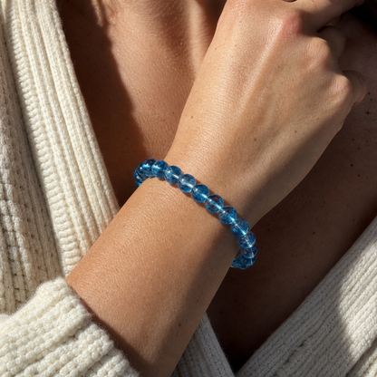 Cropped wrist view of Blue Topaz