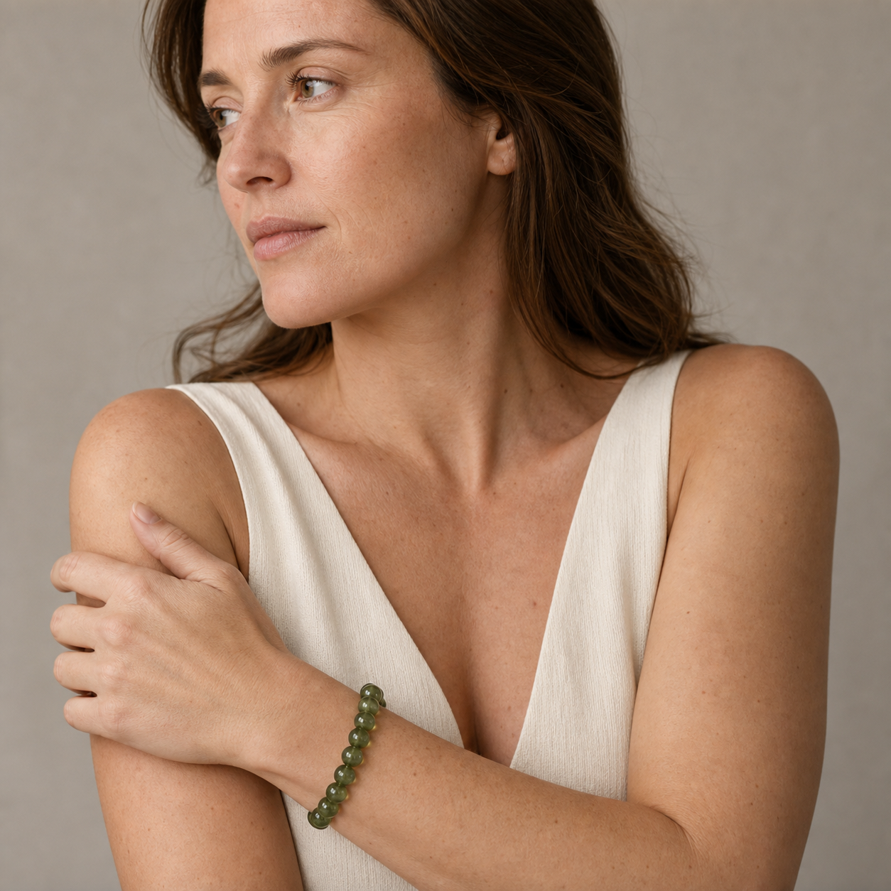 Green Apatite worn by a woman