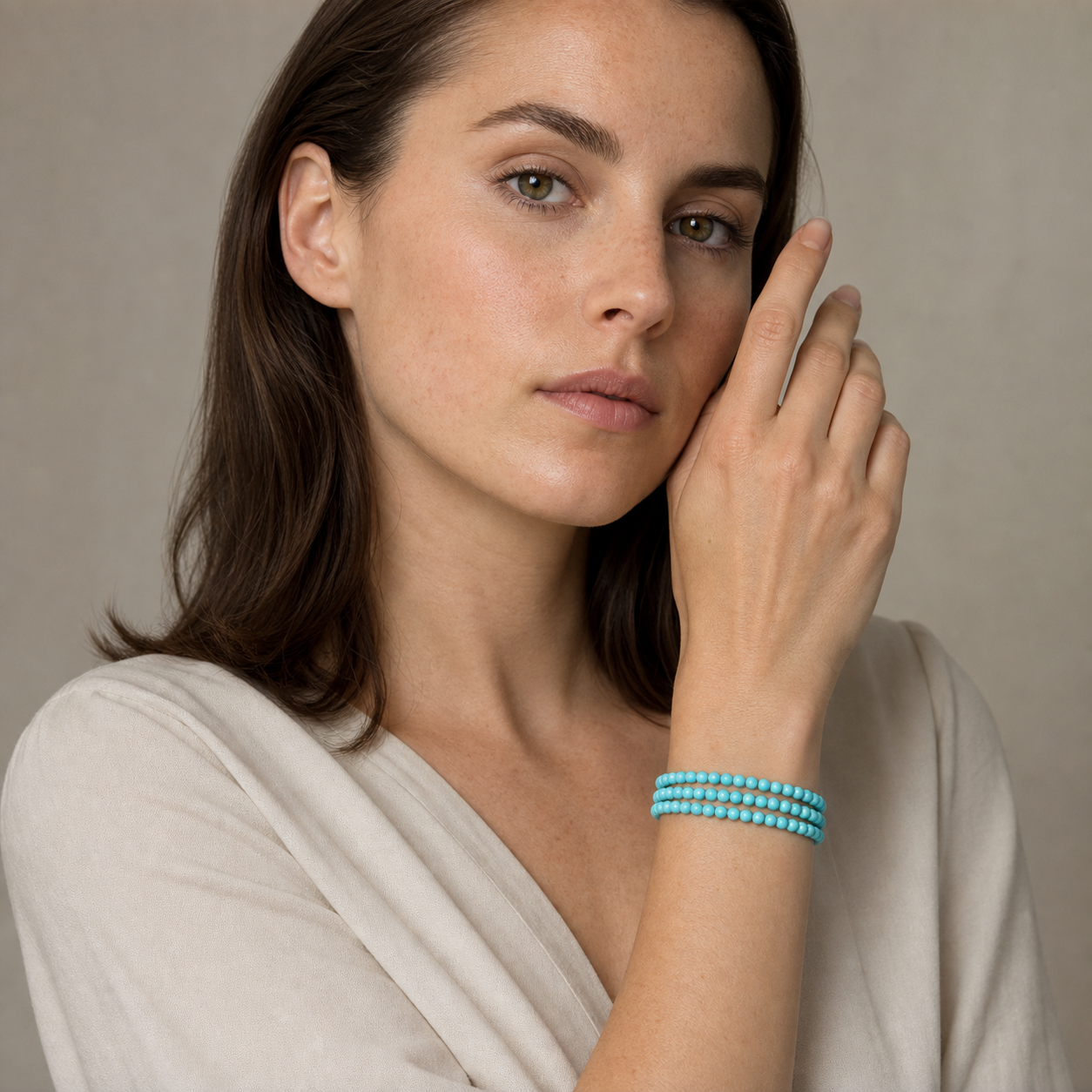 Turquoise shown on a woman from a second angle