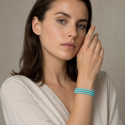 Turquoise shown on a woman from a second angle