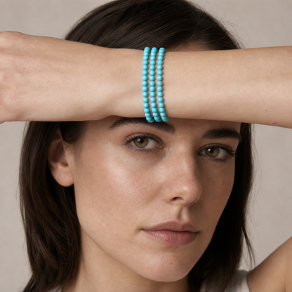 Turquoise worn by a woman with the bracelet in focus