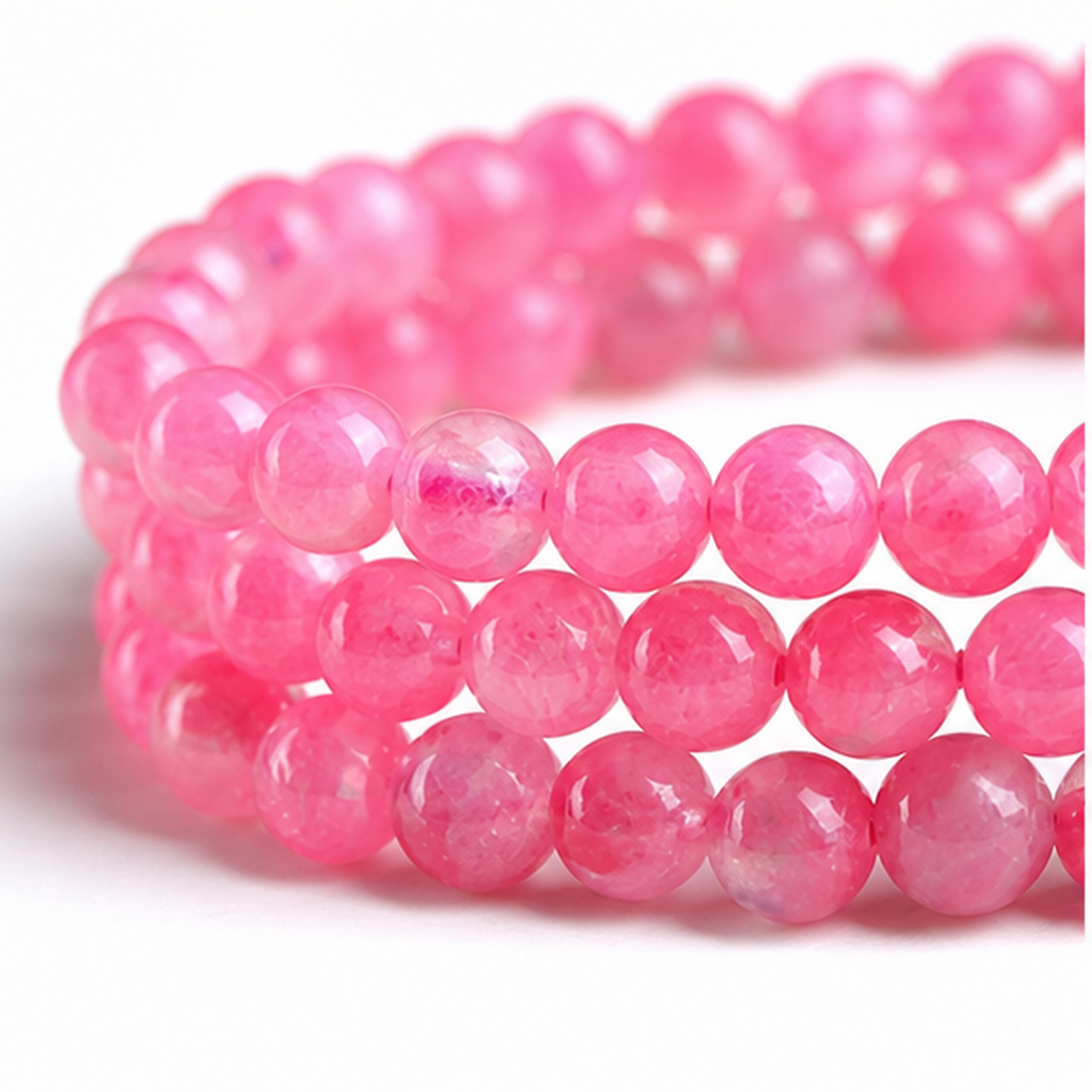 Close-up of Rhodonite bead colour and surface detail