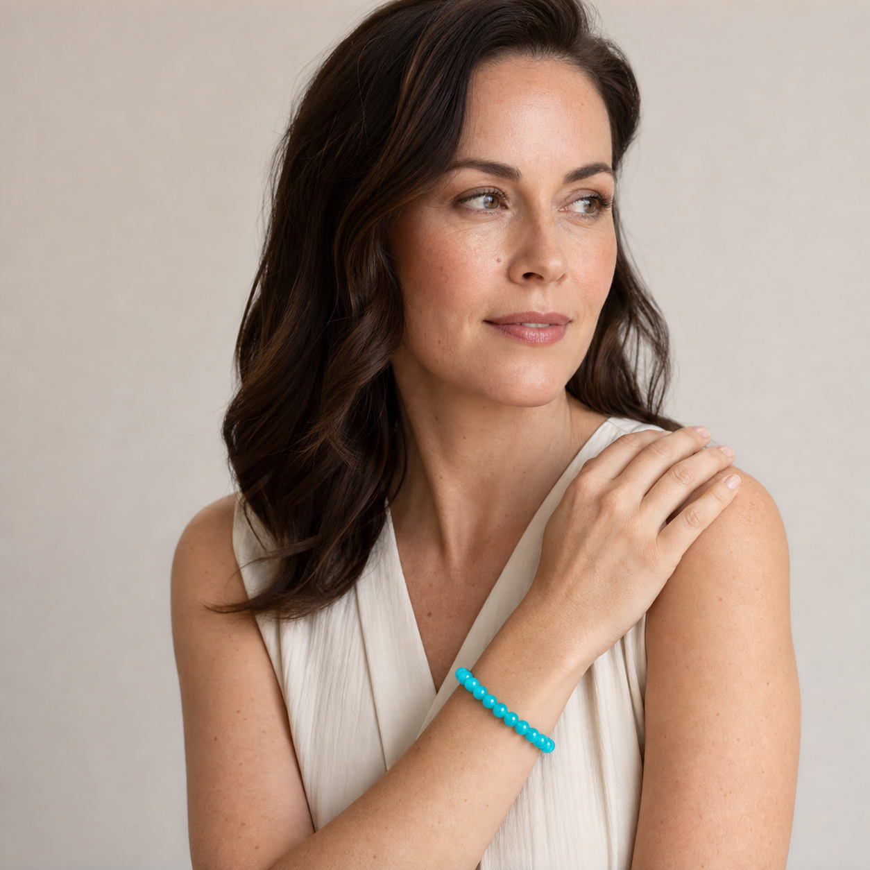 Amazonite worn by a woman