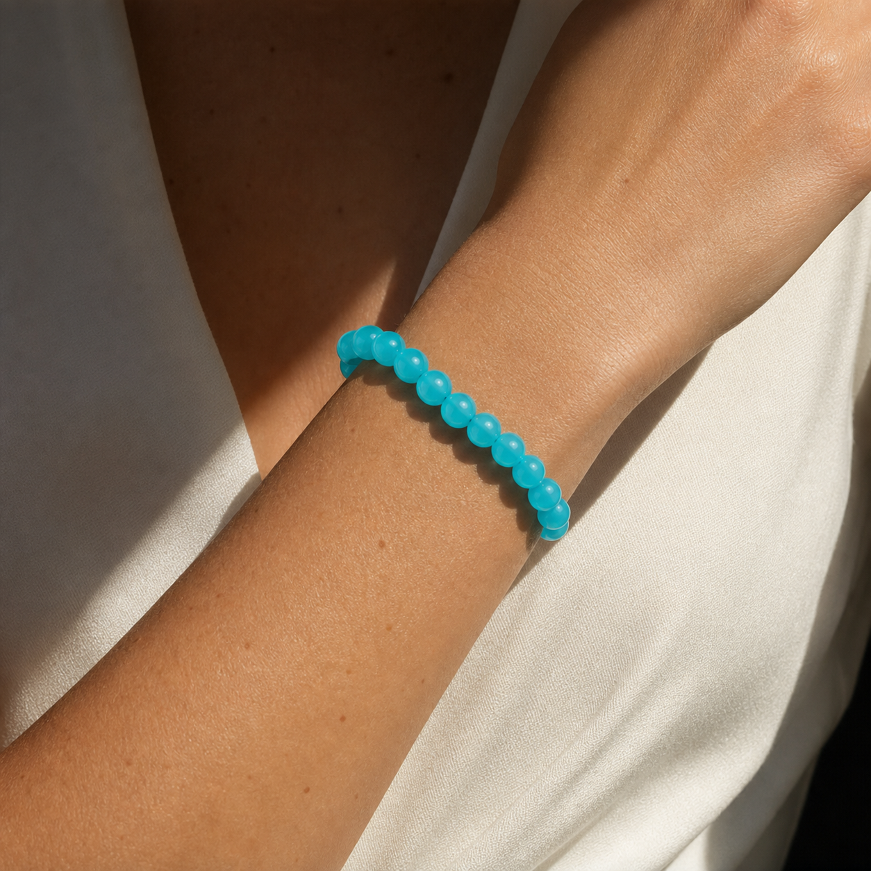 Cropped wrist view of Amazonite
