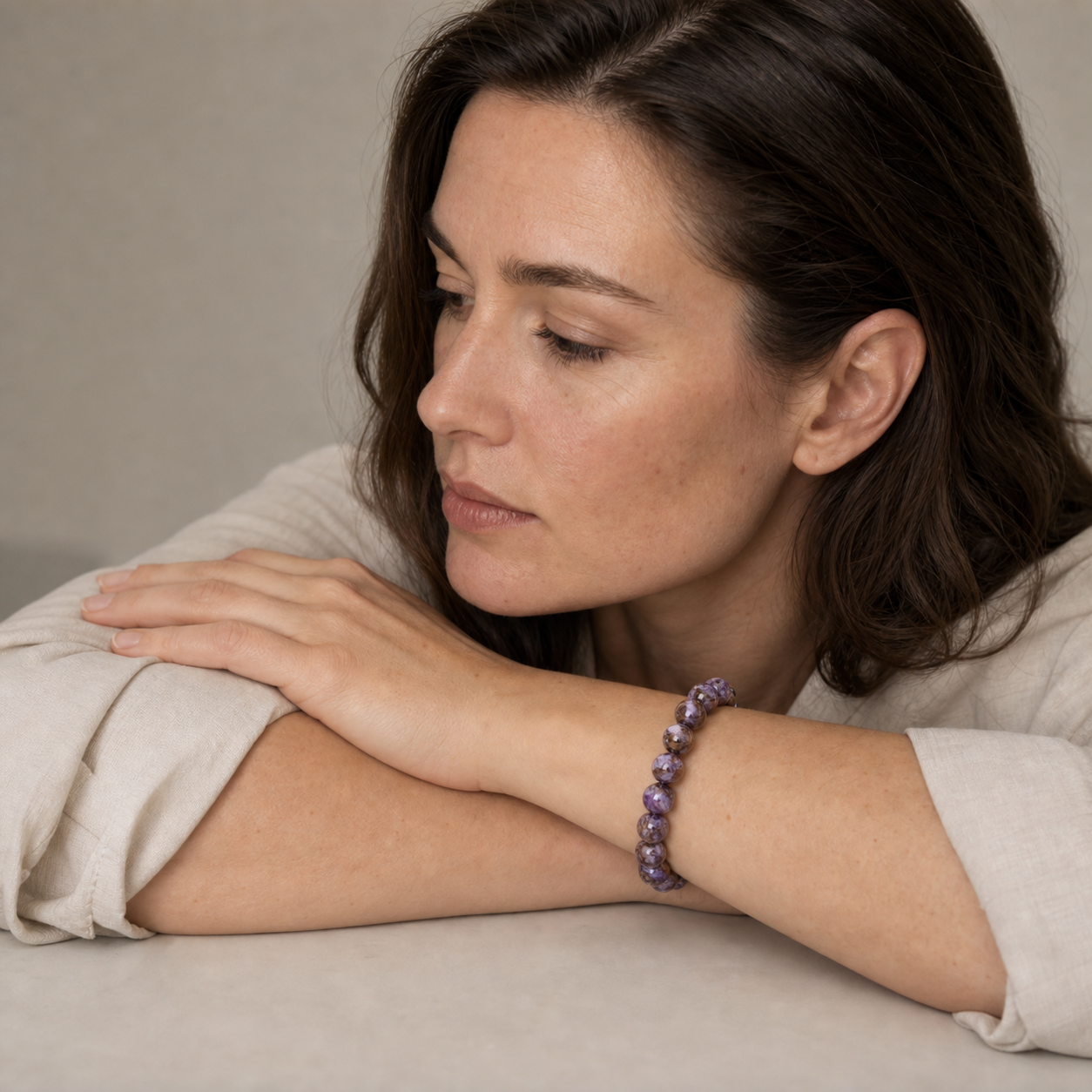 Charoite styled on a woman in a close product view