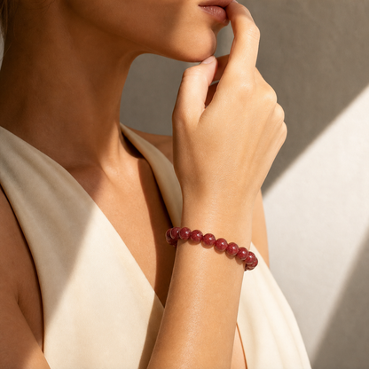Cropped wrist view of Cherry Red Strawberry Quartz