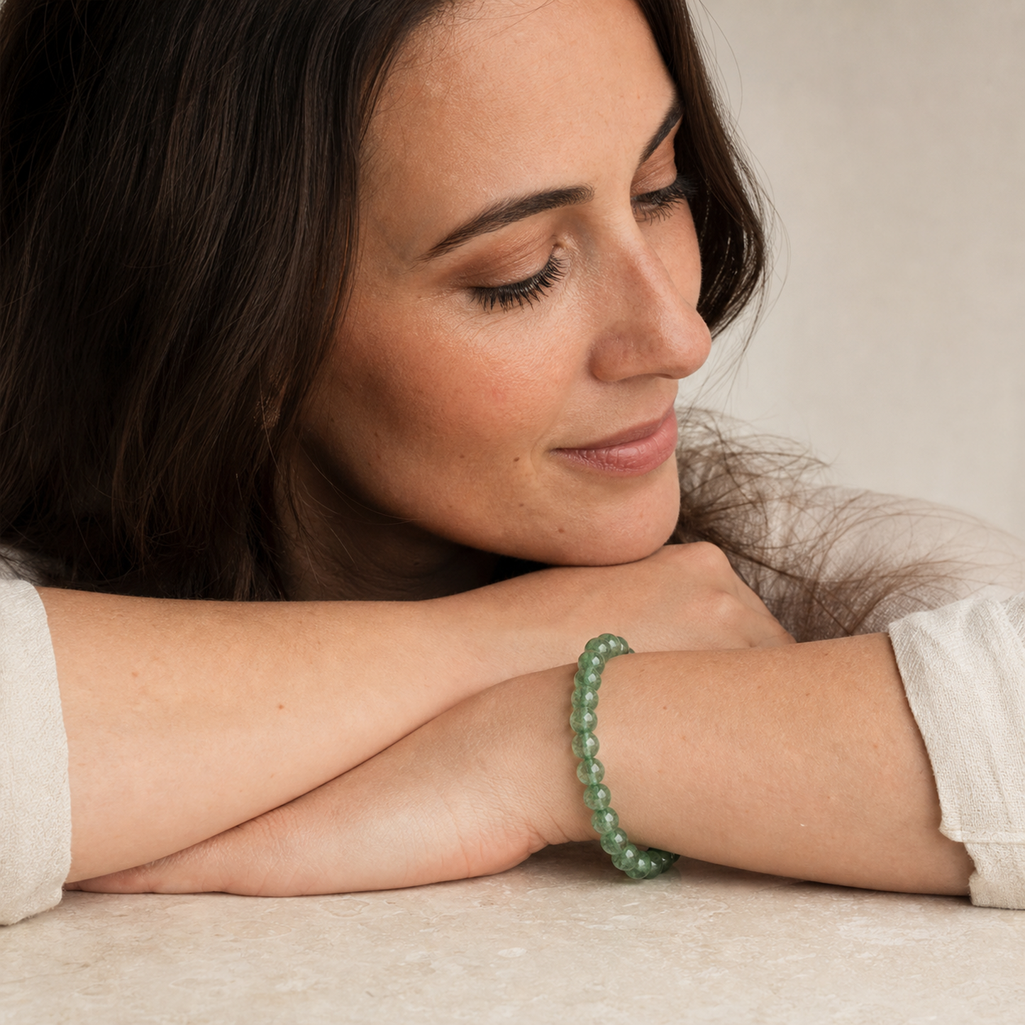 Green Strawberry Quartz shown on a woman from a second angle
