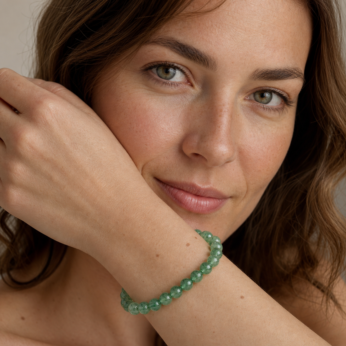 Green Strawberry Quartz styled on a woman in a close product view
