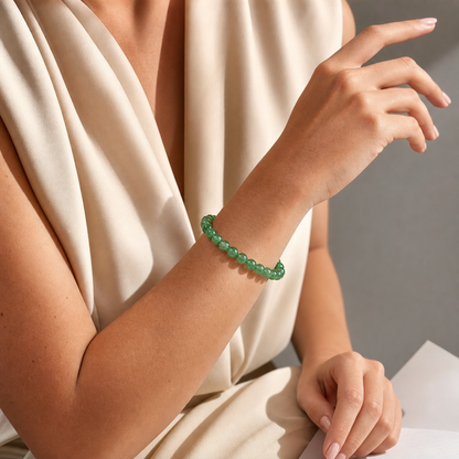 Close wrist detail of Green Strawberry Quartz