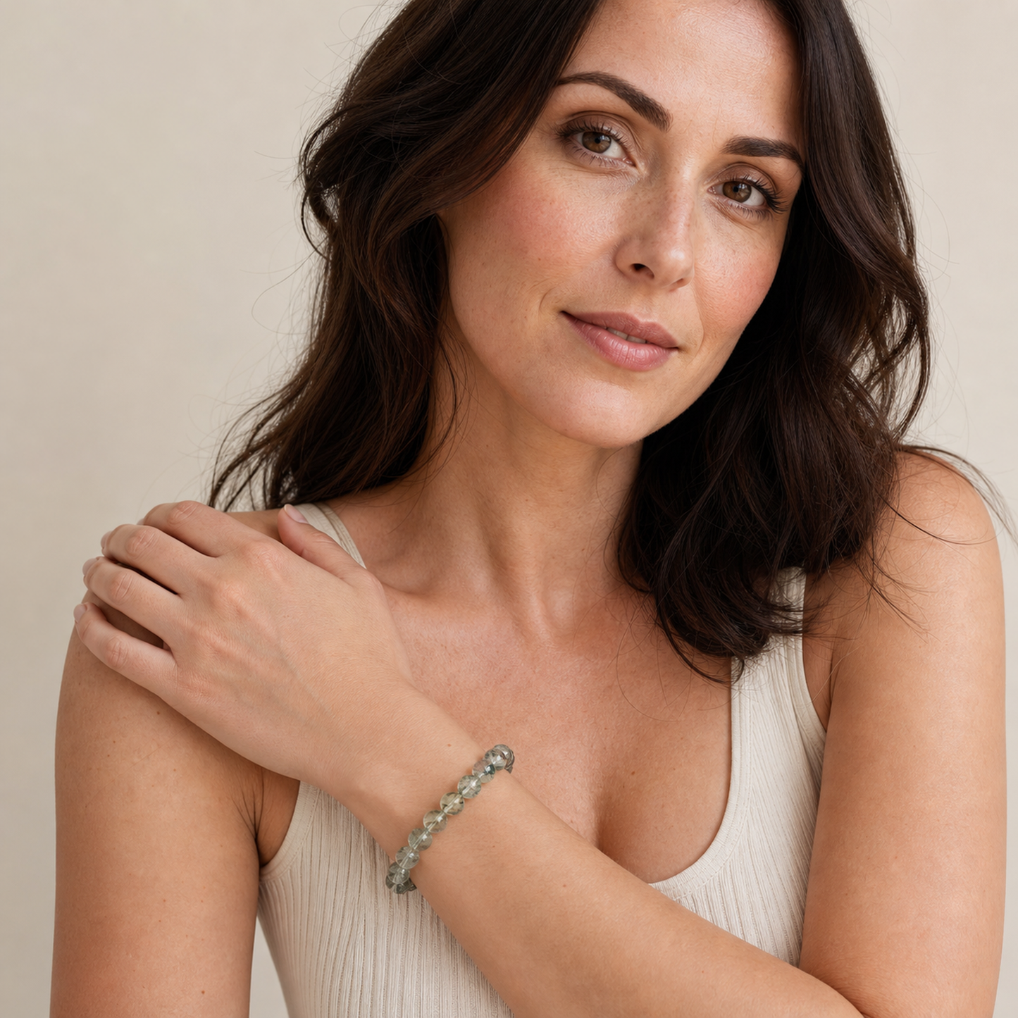 Green Super Seven worn by a woman with the bracelet in focus