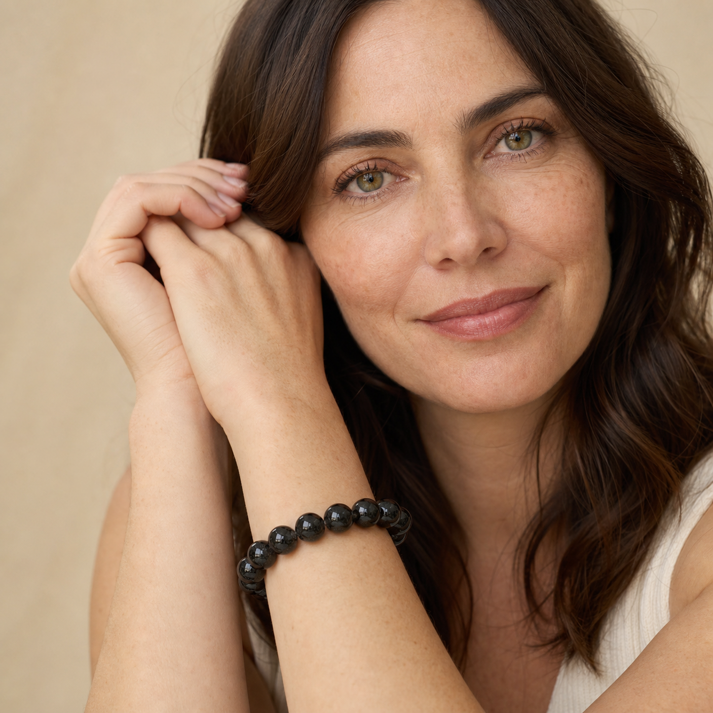 Black Rutilated Quartz shown on a woman from a second angle