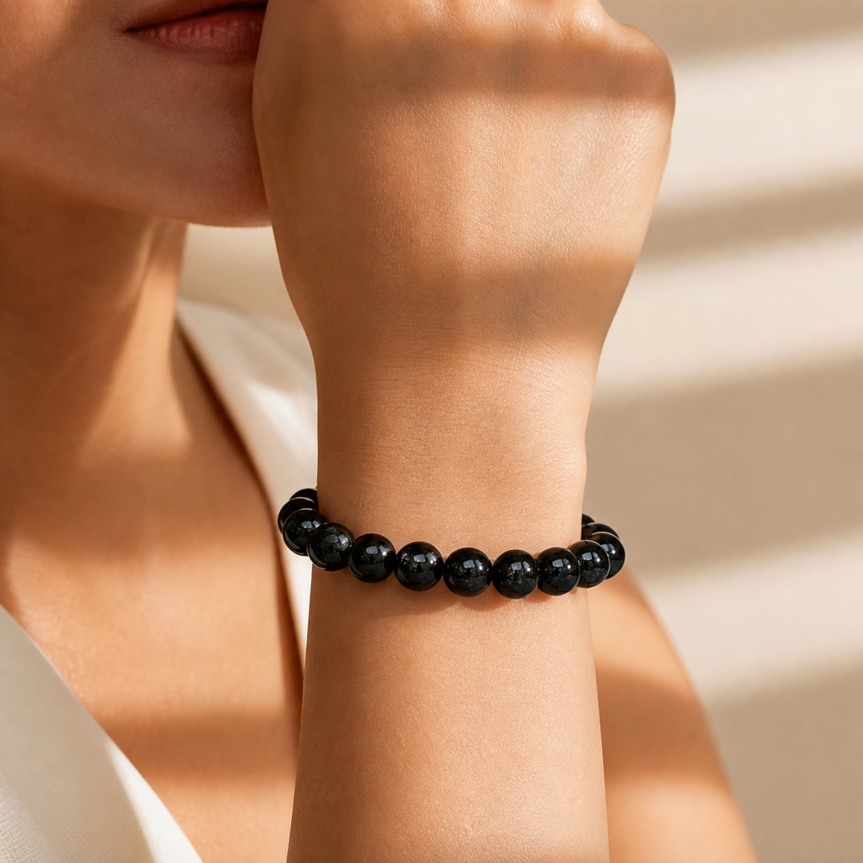 Close wrist detail of Black Rutilated Quartz