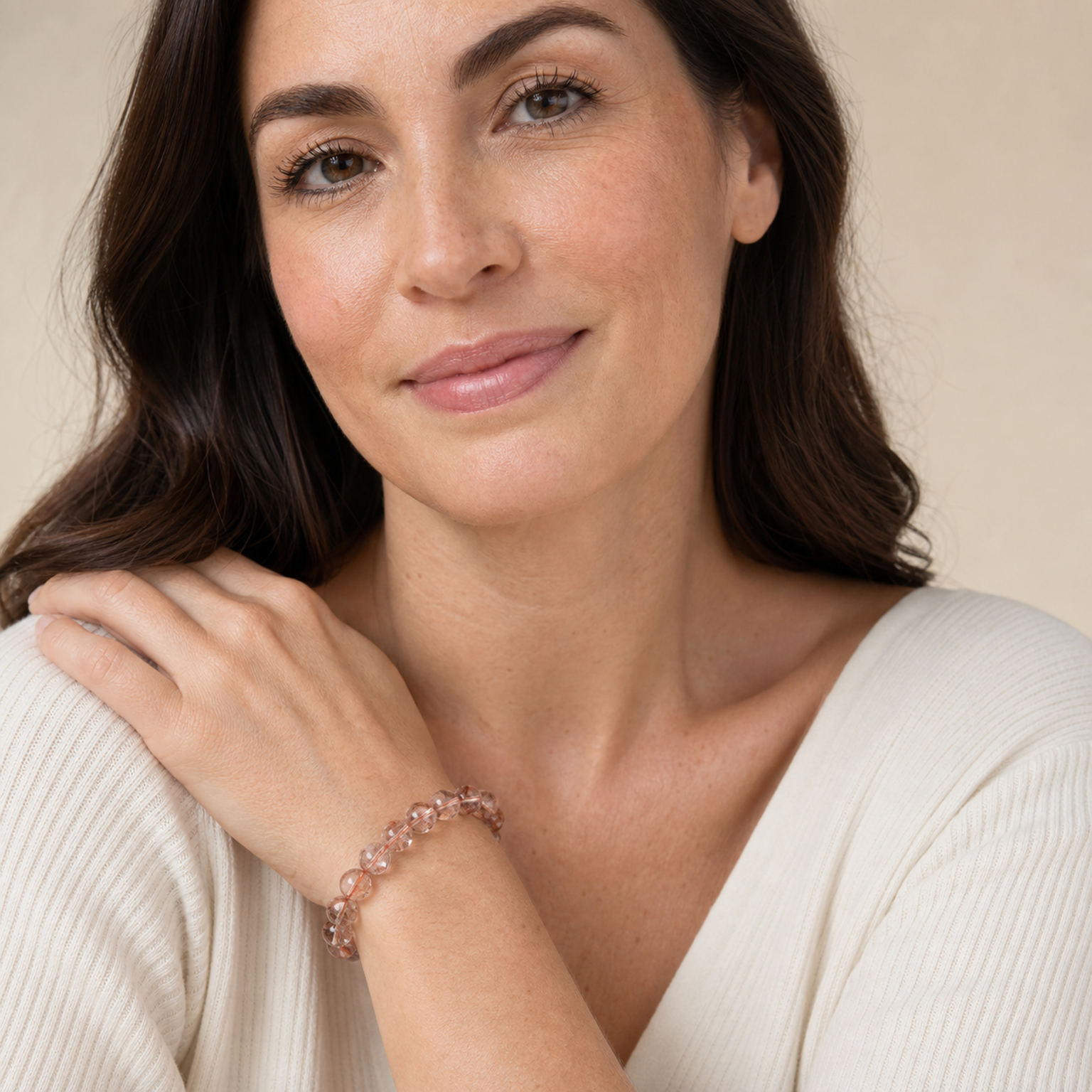 Red Rutilated Quartz styled on a woman in a close product view