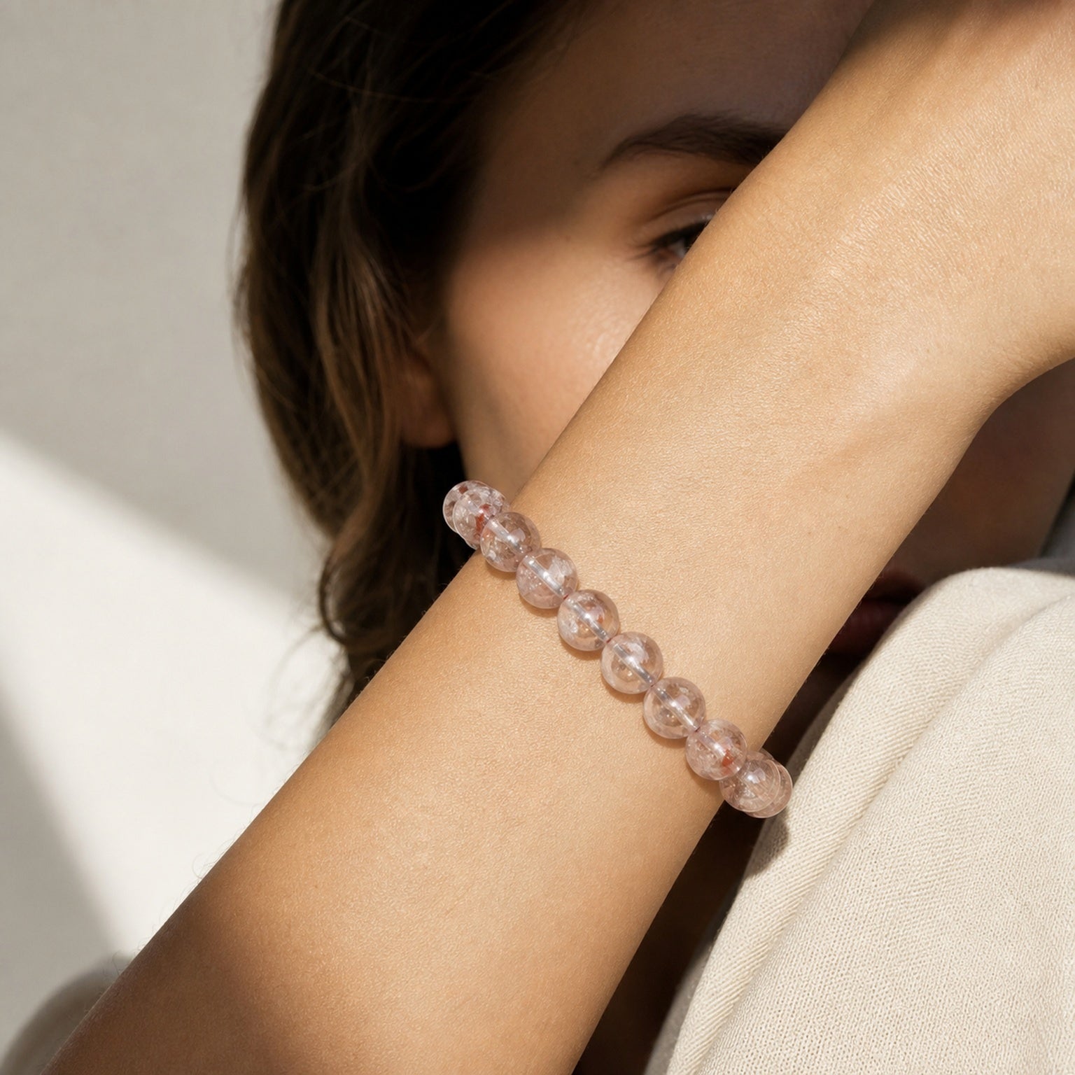 Close wrist detail of Red Rutilated Quartz