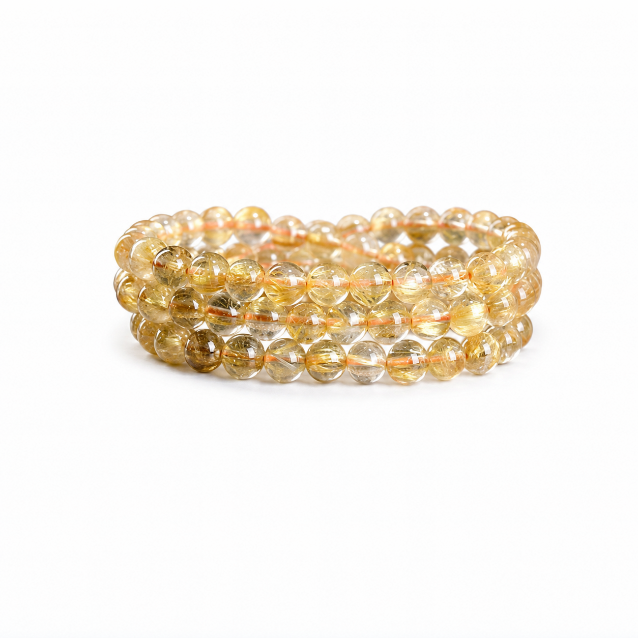 Golden Rutilated Quartz on a white background