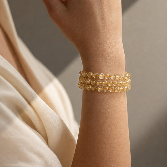 Cropped wrist view of Golden Rutilated Quartz