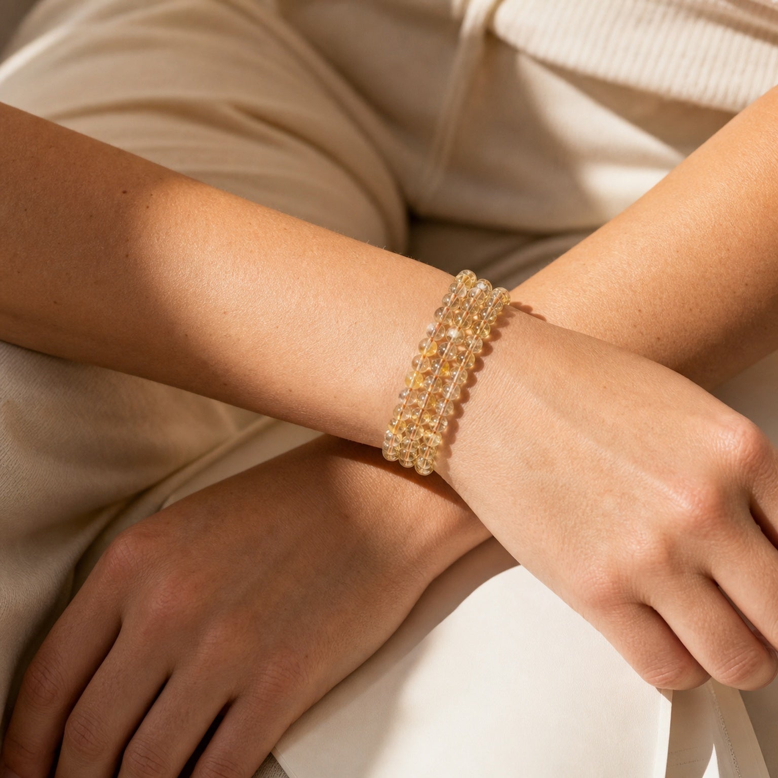 Close wrist detail of Golden Rutilated Quartz