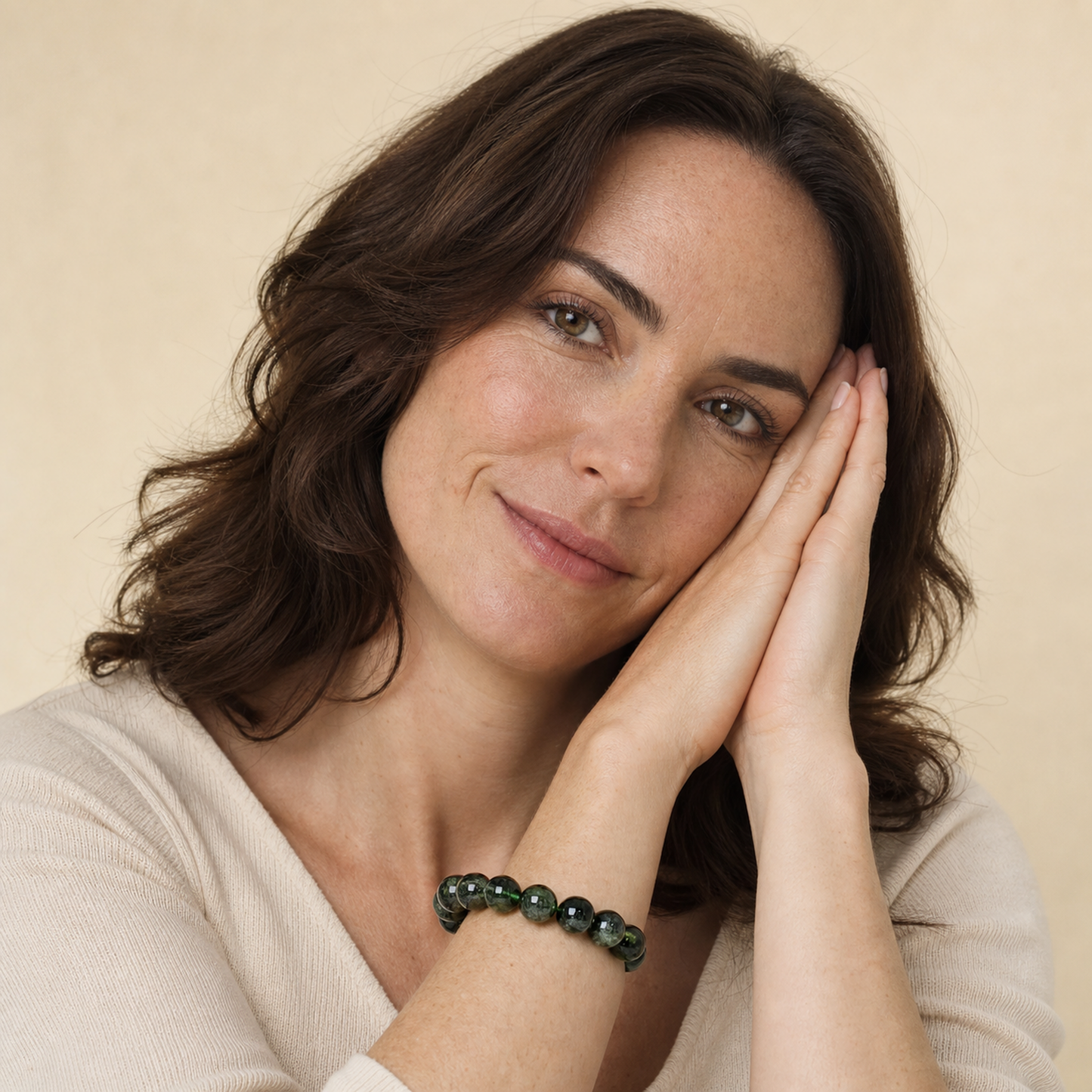 Green Rutilated Quartz shown on a woman from a second angle
