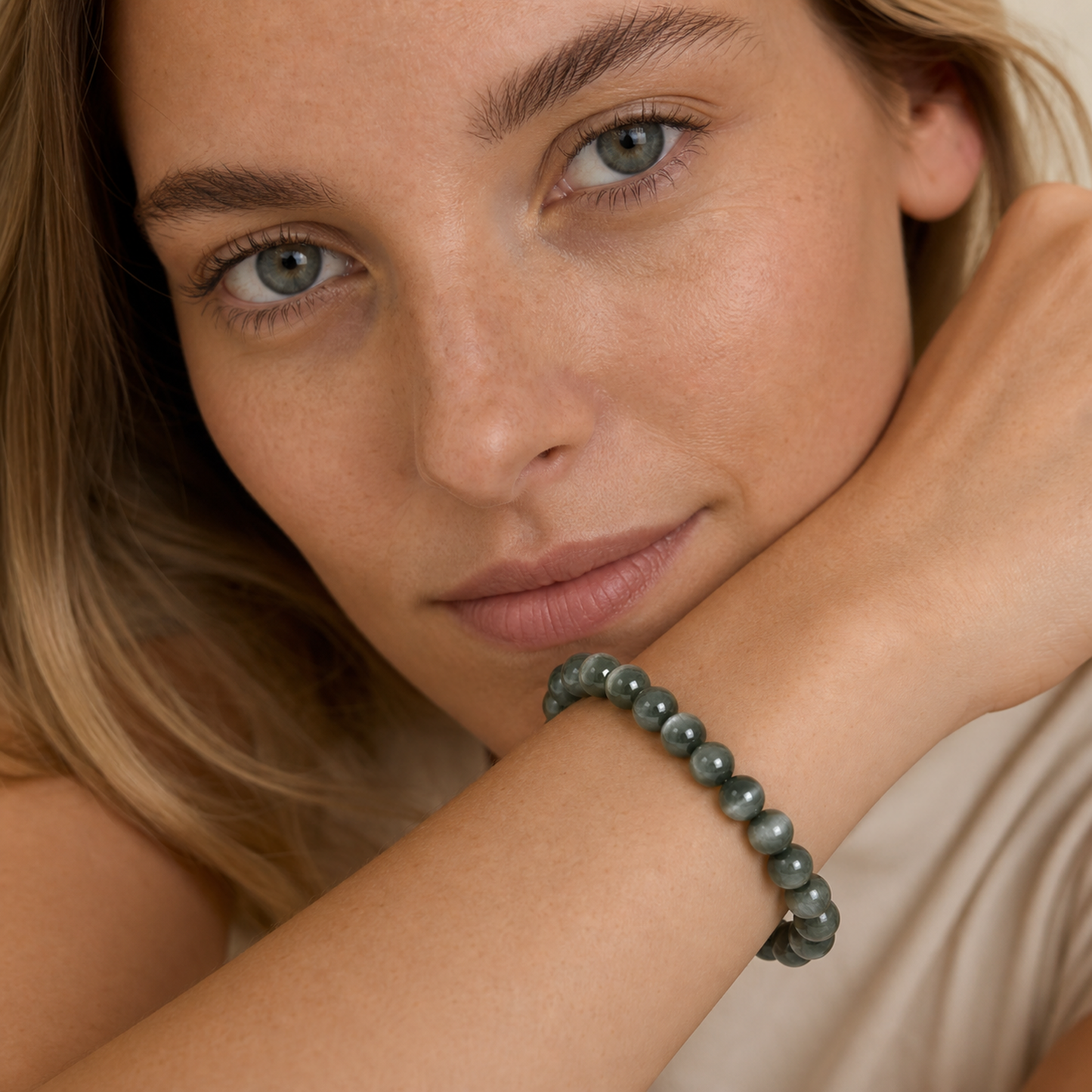 Cat's-Eye Green Rutilated Quartz shown on a woman from a second angle