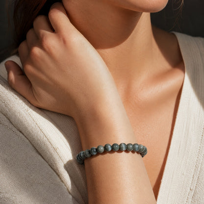 Close wrist detail of Cat's-Eye Green Rutilated Quartz