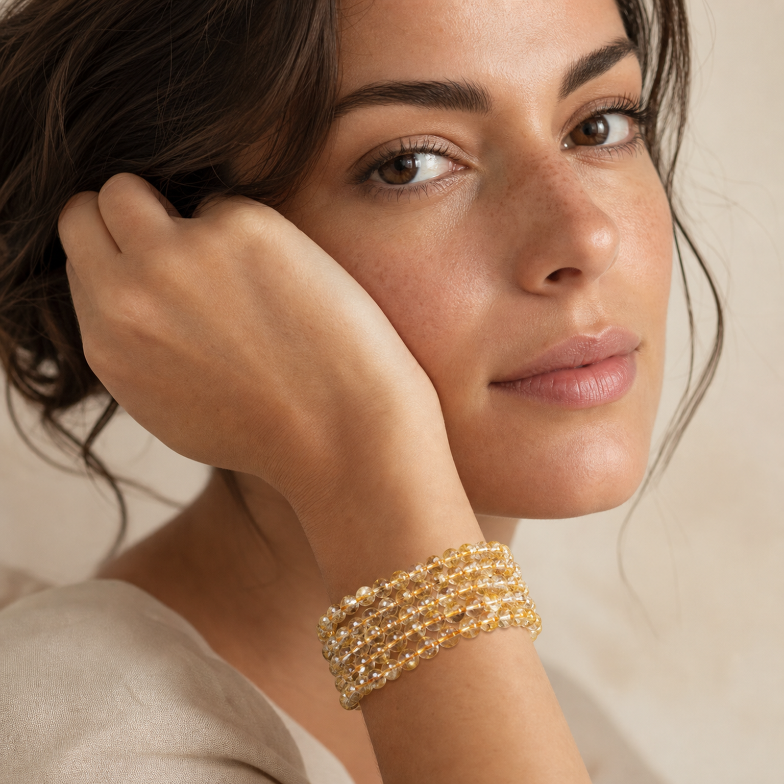 Titanium Rutilated Quartz styled on a woman in a close product view