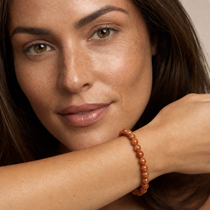 Copper Rutilated Quartz worn by a woman