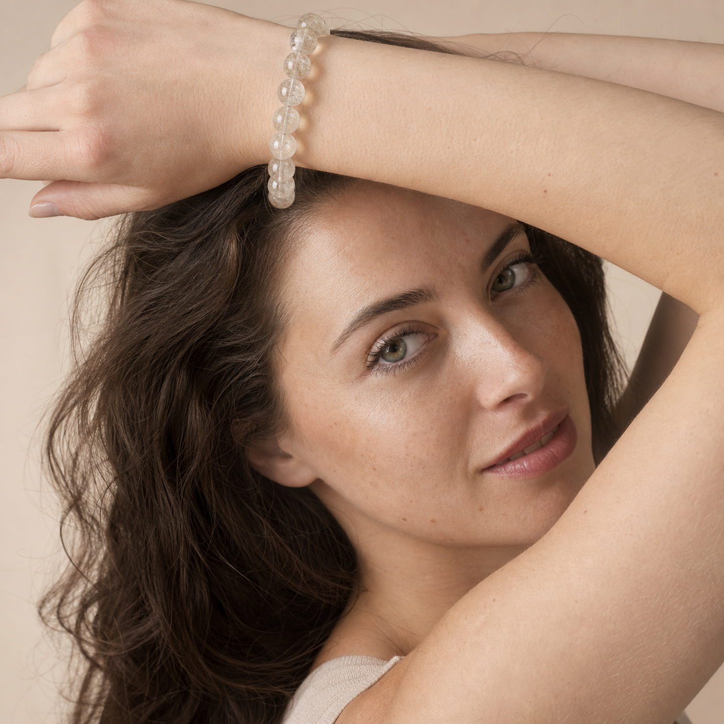 Golden Rabbit Hair Quartz styled on a woman in a close product view