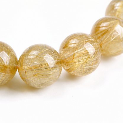 Close-up of Venus Hair Quartz bead colour and surface detail