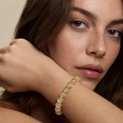 Venus Hair Quartz worn by a woman with the bracelet in focus