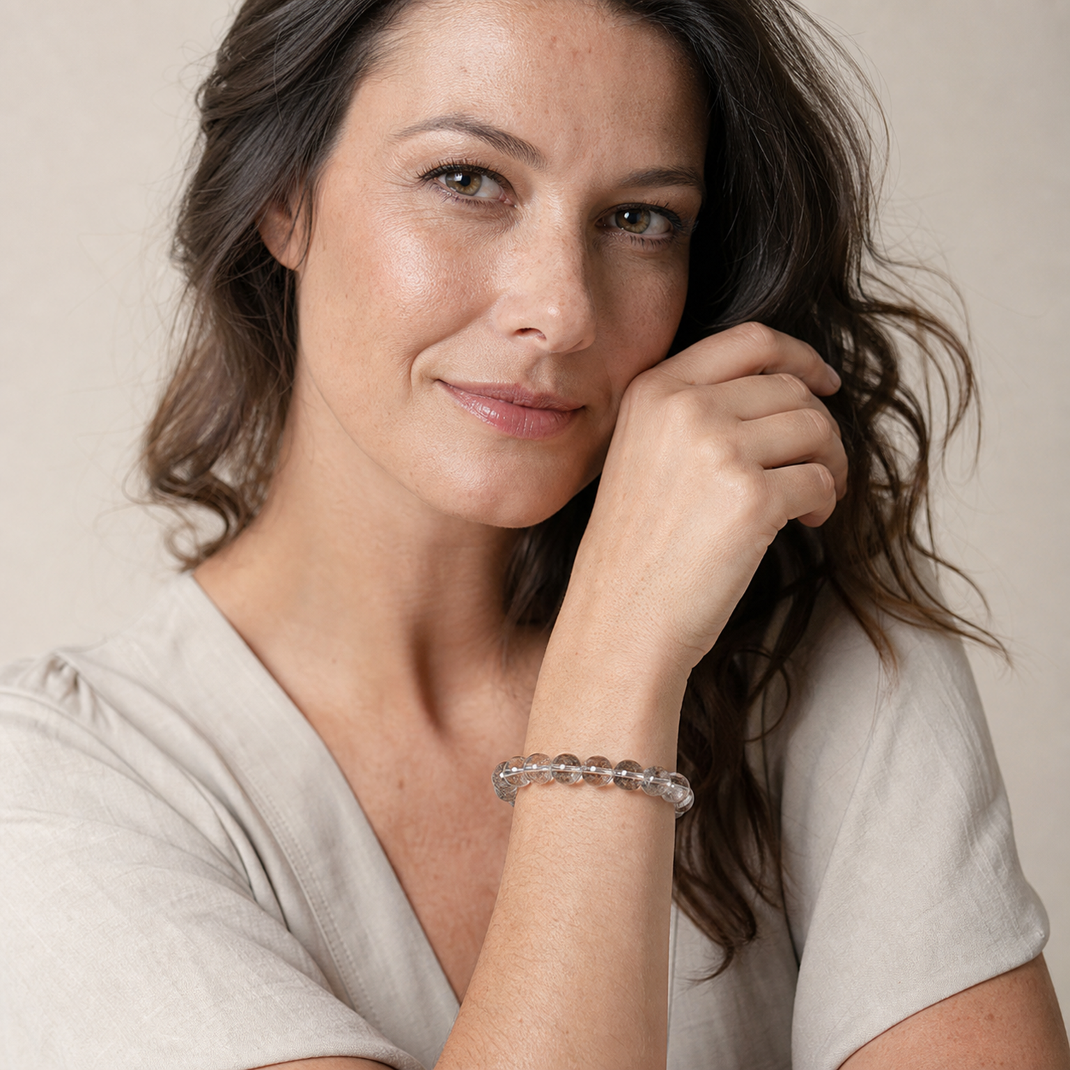 Silver Rutilated Quartz styled on a woman in a close product view