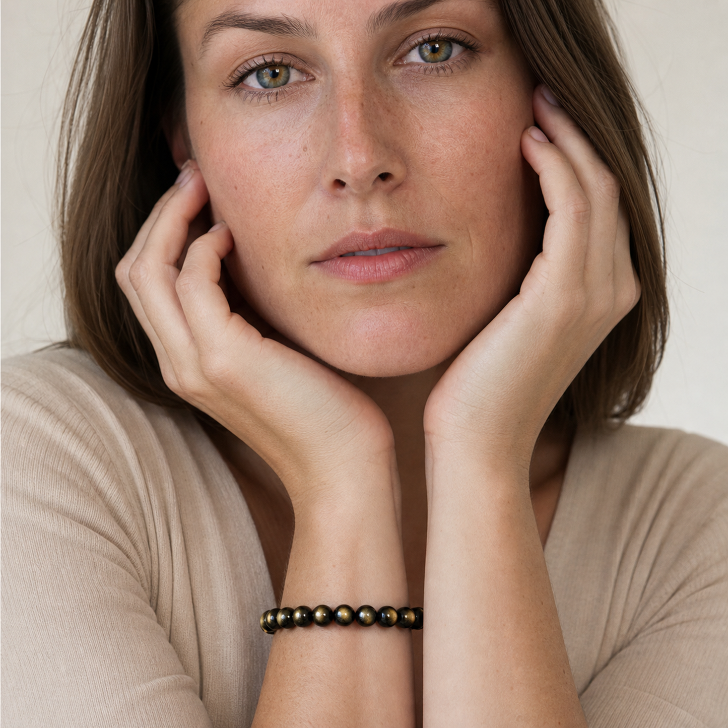 Gold Sheen Obsidian worn by a woman