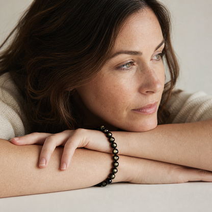 Gold Sheen Obsidian shown on a woman from a second angle