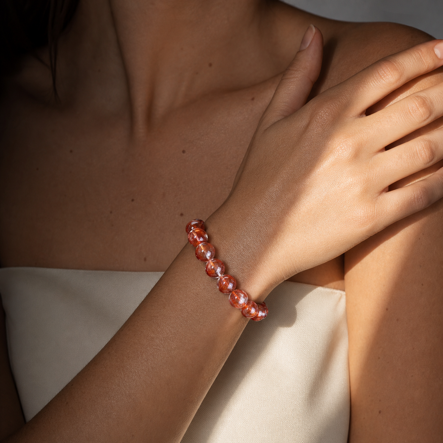 Cropped wrist view of Red Hematoid Quartz