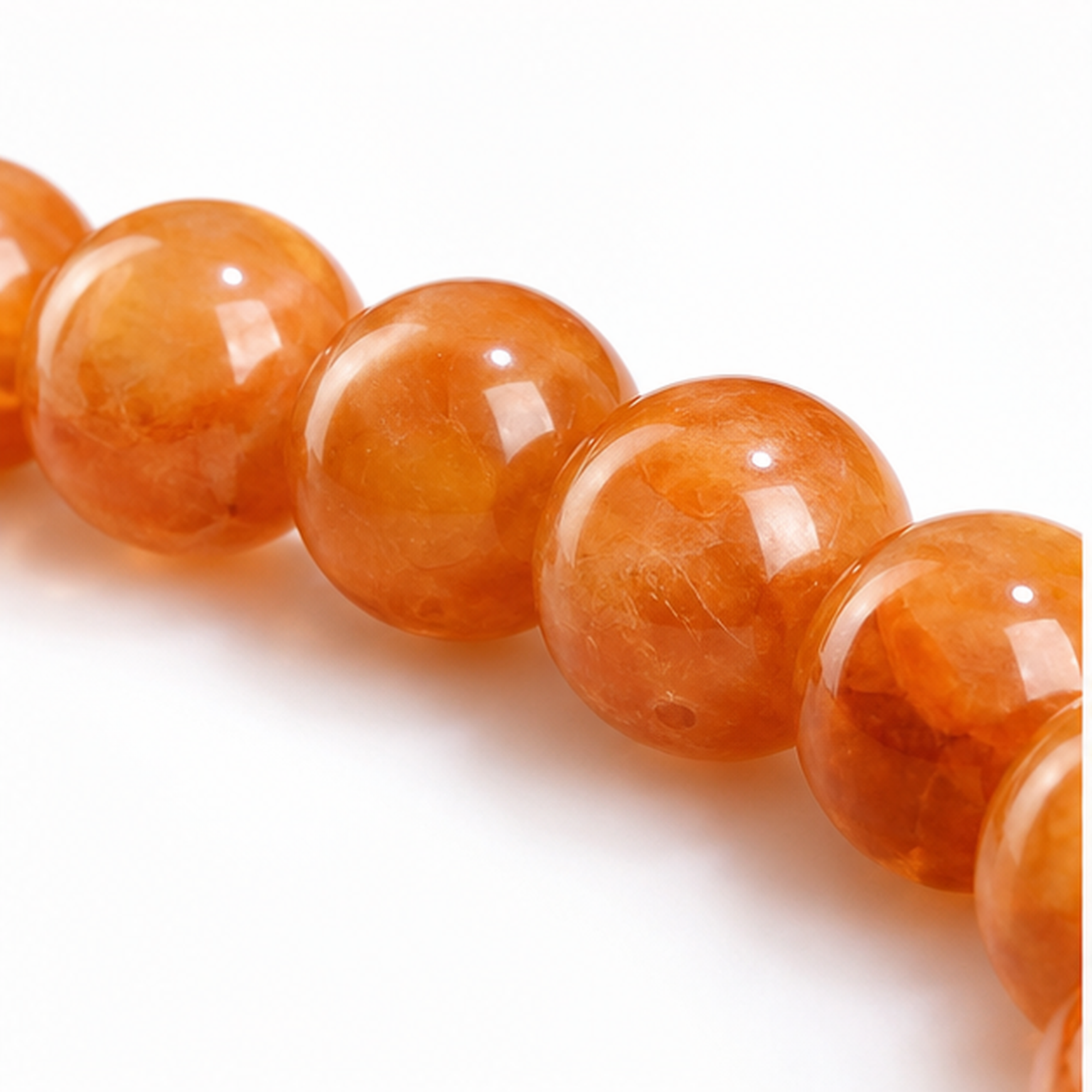 Close-up of Yellow Hematoid Quartz bead colour and surface detail